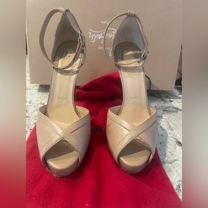 Nude Christian Louboutin heels